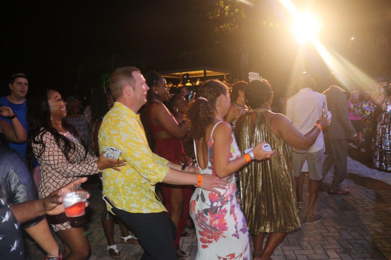 Patrons doing Conga line
