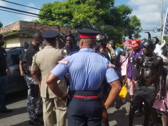 Defiant Grenada Jab Jabs stopped by police